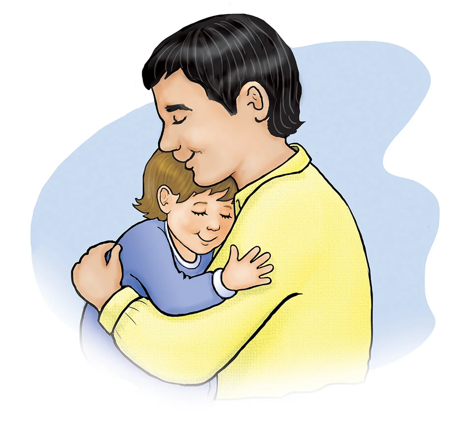 A father hugs his child goodnight