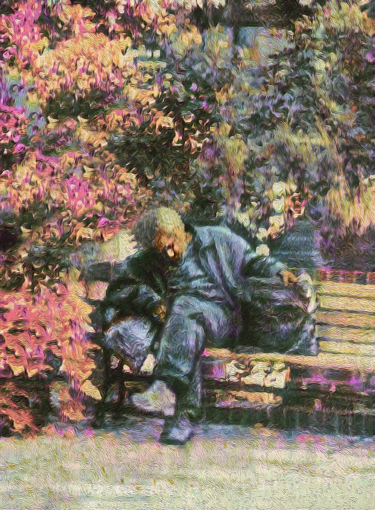 A man sits on a city bench and adjusts his bags