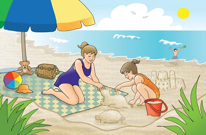 A woman and a child build animals out of sand on a beach.