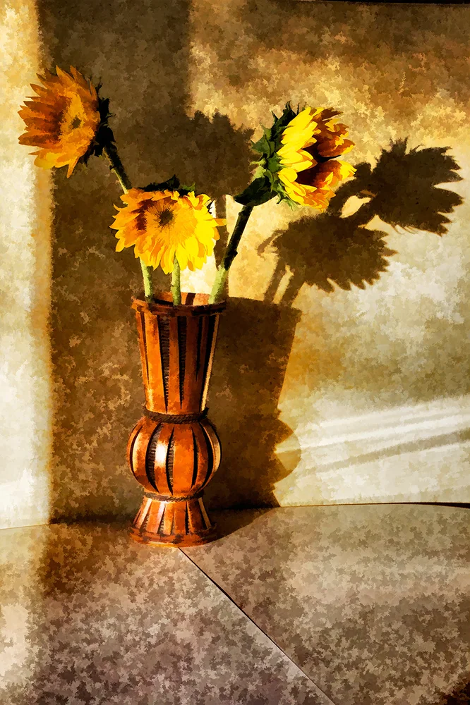 A still life of sunflowers in a vase